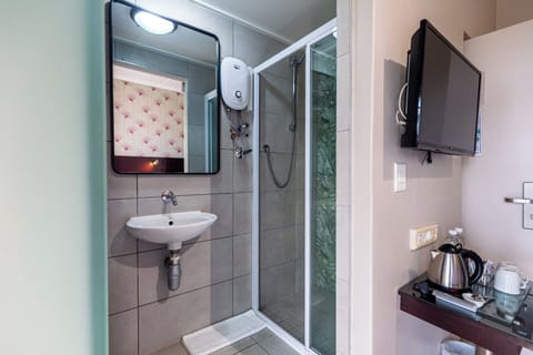 Shower, free toiletries, hair dryer, towels