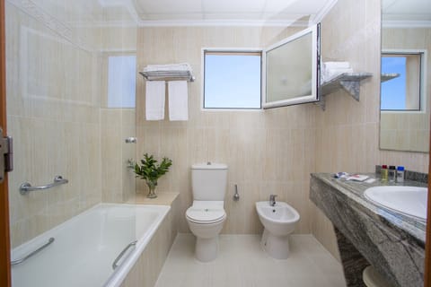 Bathtub, deep soaking tub, free toiletries, hair dryer