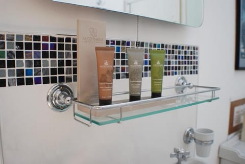 Chambord | Bathroom amenities | Separate tub and shower, rainfall showerhead, designer toiletries