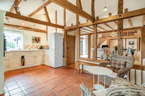 Cottage | Private kitchen | Stovetop, dishwasher, highchair, cookware/dishes/utensils