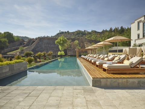 Outdoor pool, free cabanas, pool umbrellas