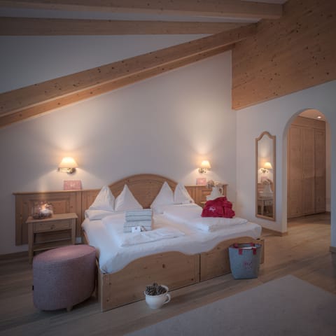 Family Room | Down comforters, minibar, in-room safe, individually decorated