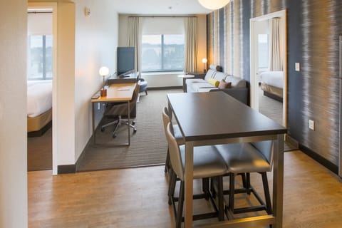 Suite, 2 Bedrooms | Desk, blackout drapes, iron/ironing board, cribs/infant beds