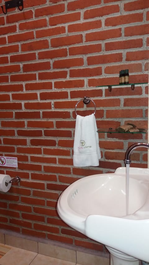 Family Room, 2 Double Beds | Bathroom | Shower, free toiletries, towels