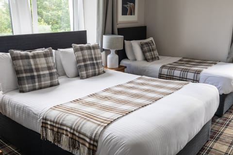 Standard Quadruple Room, Multiple Beds, Non Smoking, Ensuite | Individually decorated, free WiFi, bed sheets