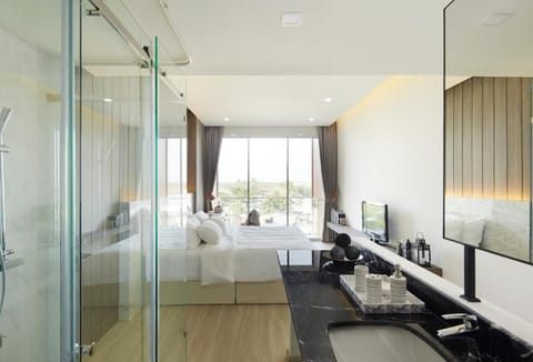 Shower, rainfall showerhead, hair dryer, towels