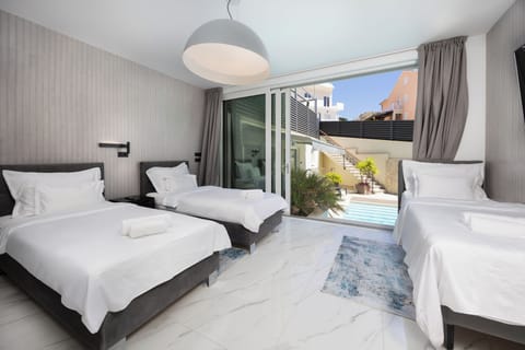 Premium bedding, down comforters, Tempur-Pedic beds, in-room safe