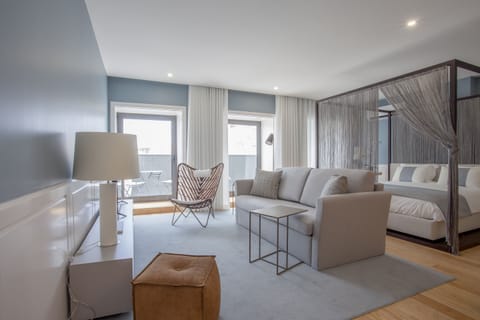 Luxury Studio, Balcony | Living area | Flat-screen TV