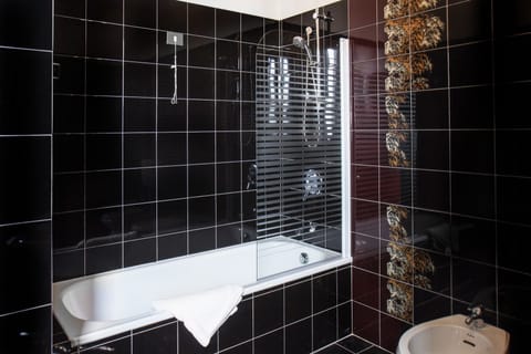 Superior Suite (4 adults) | Bathroom | Shower, free toiletries, hair dryer, slippers