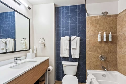 Room, 2 Queen Beds | Bathroom | Combined shower/tub, free toiletries, hair dryer, towels