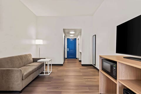 Room, 1 King Bed with Sofa bed | Premium bedding, laptop workspace, blackout drapes, iron/ironing board