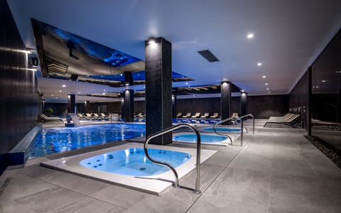 Indoor pool, open 10:00 AM to 10:00 PM, sun loungers