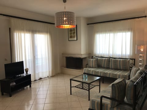 Suite, 2 Bedrooms, Sea View | Living area | 28-inch flat-screen TV with satellite channels, TV