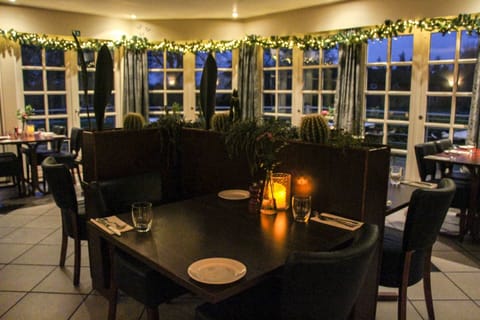 Breakfast, lunch, dinner served; Scandinavian cuisine, garden views 