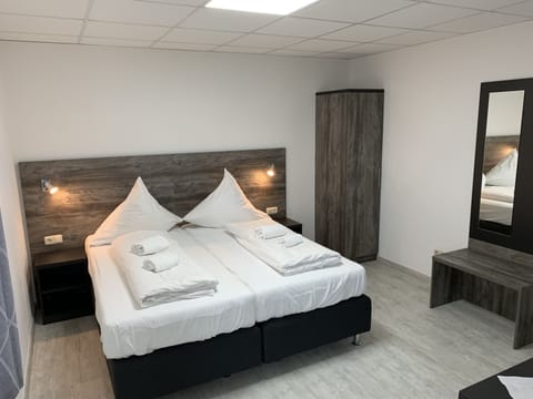 Double or Twin Room | Desk, blackout drapes, free wired internet, bed sheets