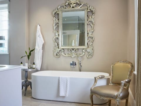 Shower, designer toiletries, bathrobes, slippers