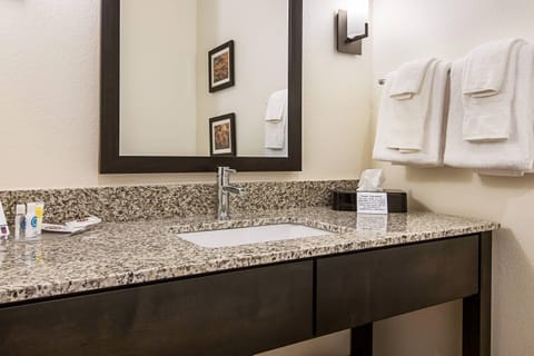 Desk, laptop workspace, blackout drapes, iron/ironing board