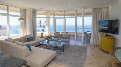 Luxury Apartment | Living area | Flat-screen TV