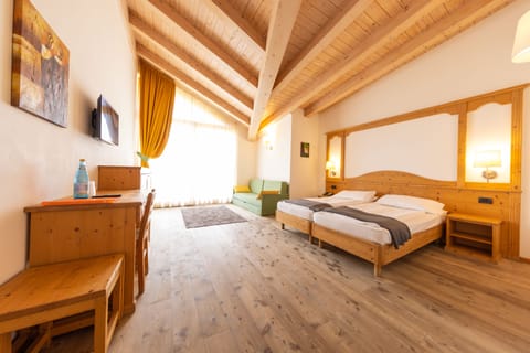 Quadruple Room | Hypo-allergenic bedding, down comforters, minibar, in-room safe