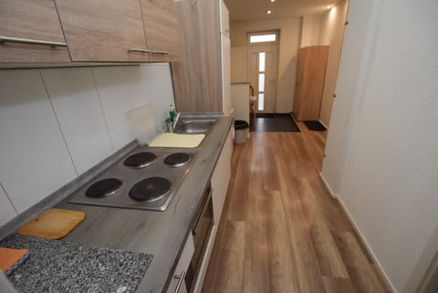 Fridge, stovetop, coffee/tea maker, cookware/dishes/utensils