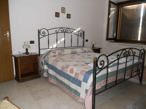 Triple Room, Shared Bathroom | Iron/ironing board, bed sheets, wheelchair access