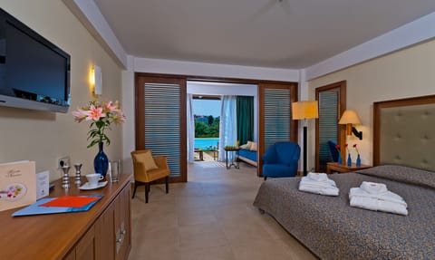 Family Room (with Sharing Pool) | Premium bedding, minibar, desk, blackout drapes