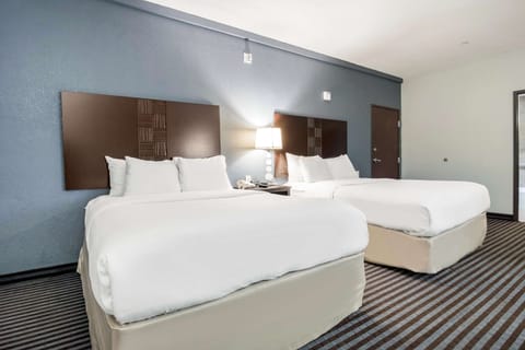 Pillowtop beds, desk, laptop workspace, free WiFi