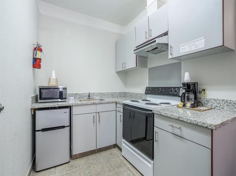 Studio Suite, 1 King Bed, Non Smoking (Second Floor, Interior Stairs Only) | Premium bedding, blackout drapes, iron/ironing board, free WiFi