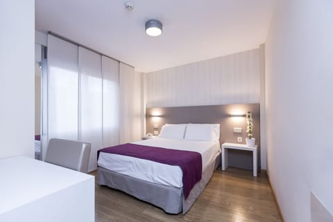 Desk, blackout drapes, iron/ironing board, free WiFi