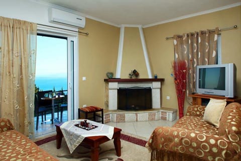Apartment, 2 Bedrooms | Living room | Flat-screen TV