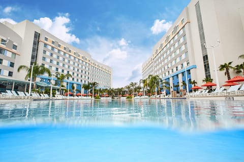 Outdoor pool, a heated pool, pool umbrellas, sun loungers