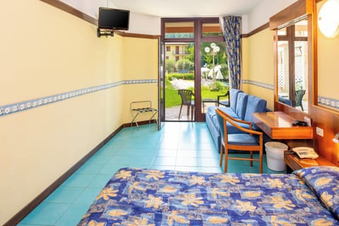 Double or Twin Room, Pool View | In-room safe, desk, bed sheets