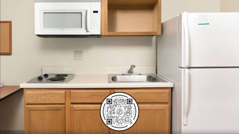 Desk, laptop workspace, blackout drapes, iron/ironing board