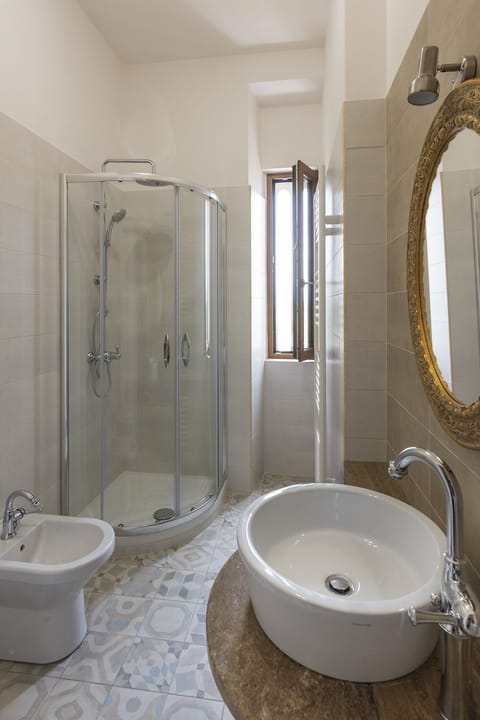 Double or Twin Room, Balcony, Garden View | Bathroom | Shower, rainfall showerhead, slippers, bidet