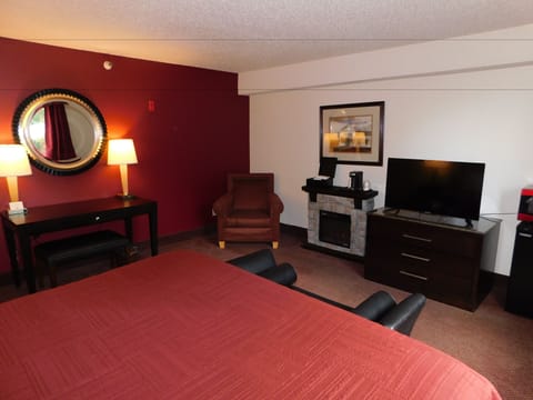 Standard Suite, 1 King Bed, Fireplace | Individually decorated, individually furnished, desk, blackout drapes