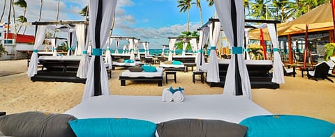 Private beach, free beach shuttle, free beach cabanas, sun loungers
