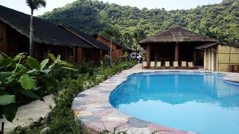 Outdoor pool, open 7:30 AM to 11 PM, sun loungers