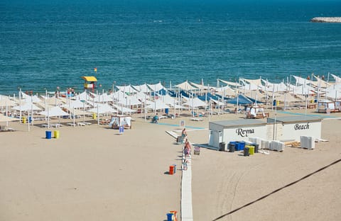 Private beach nearby, 5 beach bars