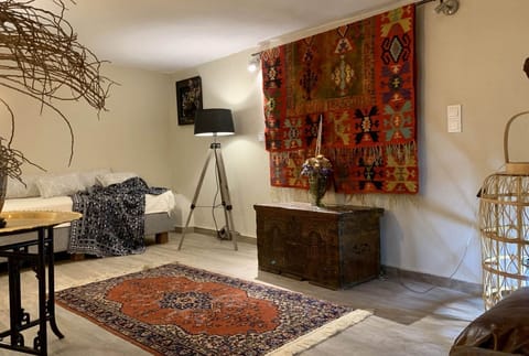 Luxury Suite | Living area | 55-inch LCD TV with premium channels, TV, Netflix