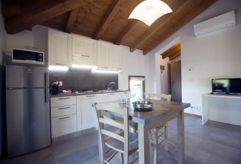 Apartment, 1 Bedroom, Garden View | Private kitchen | Full-size fridge, stovetop, espresso maker, coffee/tea maker