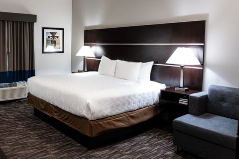 Down comforters, pillowtop beds, in-room safe, desk