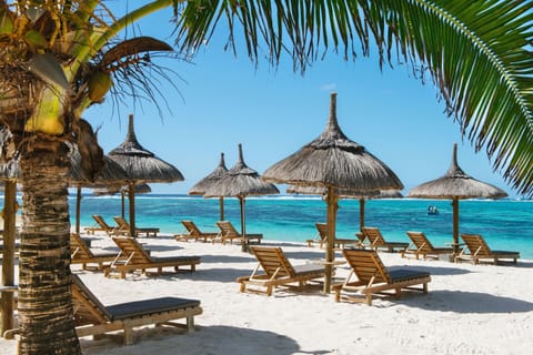 Beach nearby, white sand, sun loungers, beach umbrellas