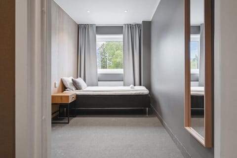 Standard Single Room, 1 Twin Bed, Shared Bathroom | Blackout drapes, soundproofing, WiFi (free), bed sheets