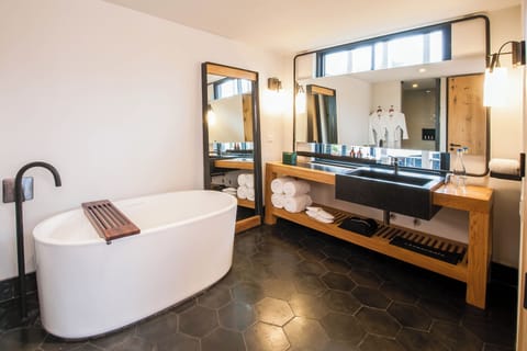 Superior Suite, 1 King Bed, Private Bathroom, Tower | Bathroom | Hair dryer, bathrobes, towels, soap