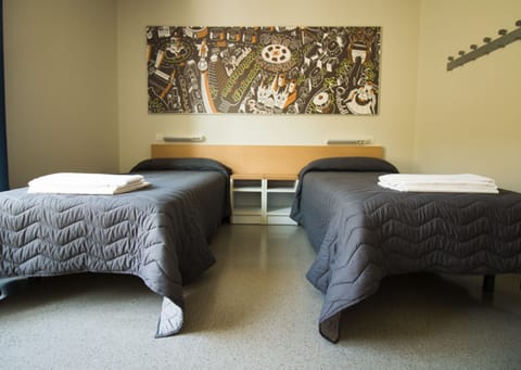 Blackout drapes, soundproofing, free WiFi, bed sheets