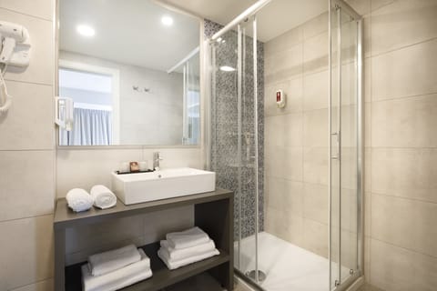 Shower, free toiletries, hair dryer, towels