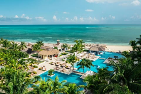 Outdoor pool, free cabanas, pool umbrellas