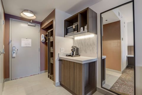 Desk, blackout drapes, iron/ironing board, free cribs/infant beds