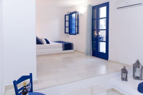 Triple Room, Pool View | Individually decorated, iron/ironing board, free cribs/infant beds