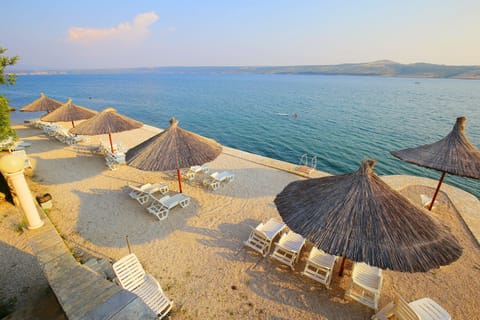 Private beach, sun loungers, beach umbrellas, scuba diving